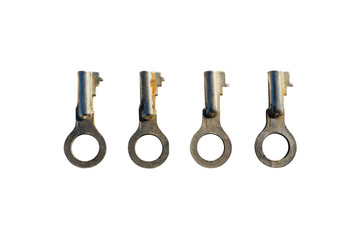  Four silver old padlock keys lying next to each other, isolated on a white background with a...