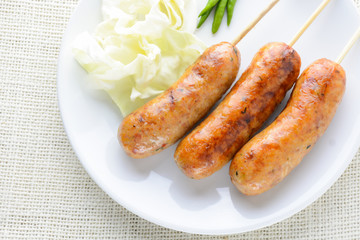 Thai Spicy Sausages, made from minced pork mixed with a variety of ingredients which makes it packed with flavour, and gives it a unique scent.