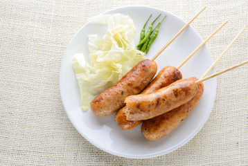 Thai Spicy Sausages, made from minced pork mixed with a variety of ingredients which makes it packed with flavour, and gives it a unique scent.