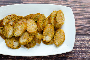 Thai Spicy Sausages, made from minced pork mixed with a variety of ingredients which makes it packed with flavour, and gives it a unique scent.