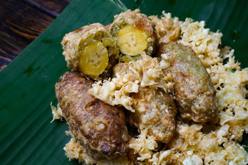 Battered and Deep-Fried Unripe Rice and Grated Coconut Banana Rolls Recipe