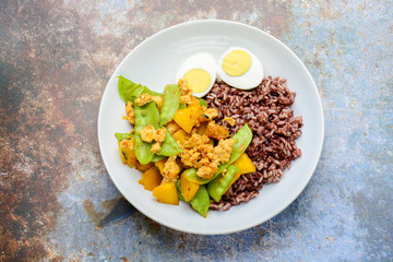 Stir Fry Snow Peas with pumpkin and chicken, served with brown rice and boiled egg