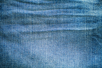 Texture of denim or blue jeans background.