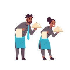 Fototapeta na wymiar professional waiters couple holding dish african american man woman restaurant workers in uniform with tray and towel food serving concept flat full length white background