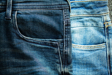 Denim blue jeans stack texture background closeup.