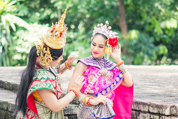 Asian woman wearing typical, traditional Thai Dress. It is literally means 