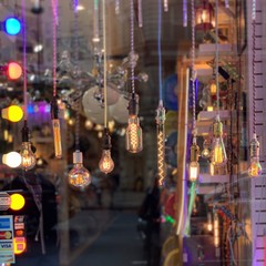 Urban shop storefront selling interesting colorful light bulbs