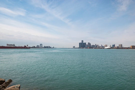 Panoramic view of the Detroit Windsor skyline with the Ambassador Bridge connecting the United States with Canada.