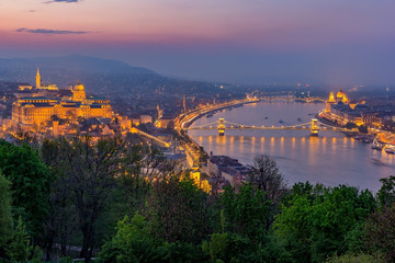 Fototapeta na wymiar Budapest, Hungary - Aerial skyline view of Budapest at blue hour with illuminated Szechenyi Chain Bridge, Elisabeth Bridge, Citadel taken from above River Daube