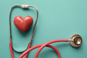 Red heart with stethoscope, heart health,  health insurance concept, World heart day, world health day