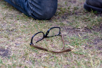Glasses on the grass in the park 