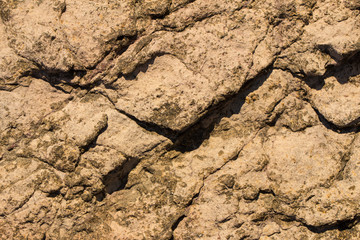 Rock plate. Colored stone surface. Wall of the house. Geology and Metamorphic rocks.