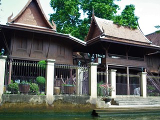 old woods house on river at bangkok