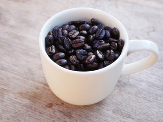 aroma coffee cup on wooden background