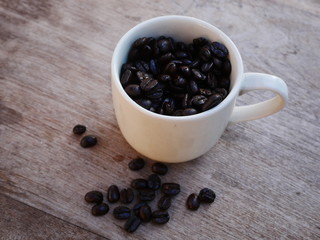 aroma coffee cup on wooden background