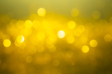 gold abstract background with bokeh defocused lights