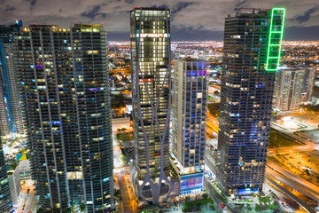 Fototapeta na wymiar Aerial drone photo Downtown Miami skyscrapers modern architecture with neon lights