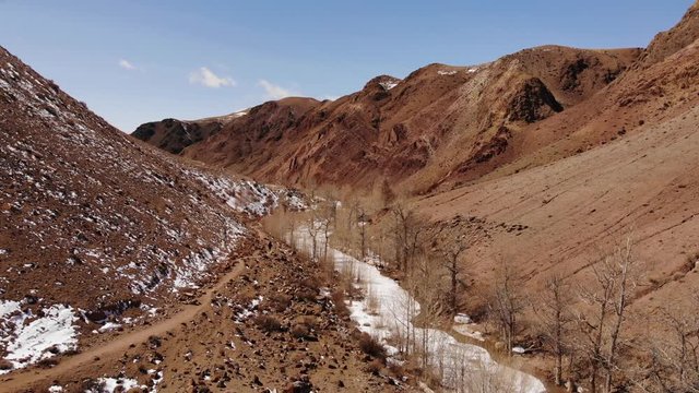 Frozen River Bed In The Red Mountains