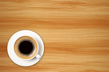 Top view of coffee cup on a wood background. Template for your design.