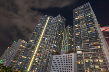 Fototapeta na wymiar Highrise towers Downtown Miami Brickell. Long exposure clouds motion blur