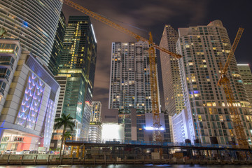 Night photo of Downtown Miami skyscrapers and construction site