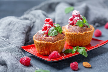 Tartlets with red raspberries and frangipani.