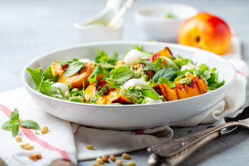 Salad with nectarines and peppermint pesto sauce.