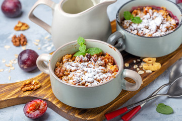 Crumble of red cherry plum, oatmeal and walnut.