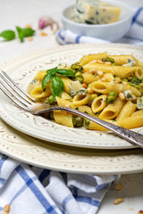 Delicious vegetarian pasta with green peas sauce.