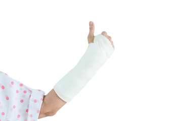 Adult Asian woman broken arm from accident with copy space showing her thumb up.  Concept of health care and aging society.