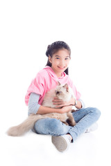 Obraz premium Pretty asian girl sitting on the floor and holding her cat with smiles over white background