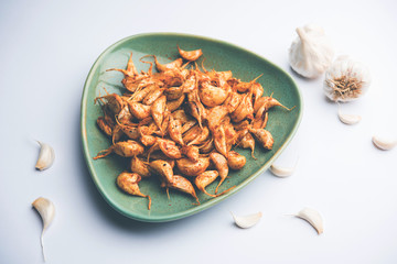 Garlic Fry or Tala Hua Lahsun in hindi, is a popular side dish or snacks from maharashtra, India
