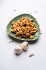 Garlic Fry or Tala Hua Lahsun in hindi, is a popular side dish or snacks from maharashtra, India