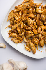Garlic Fry or Tala Hua Lahsun in hindi, is a popular side dish or snacks from maharashtra, India
