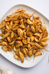 Garlic Fry or Tala Hua Lahsun in hindi, is a popular side dish or snacks from maharashtra, India