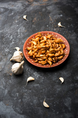 Garlic Fry or Tala Hua Lahsun in hindi, is a popular side dish or snacks from maharashtra, India