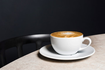 cup of cappuccino on the table