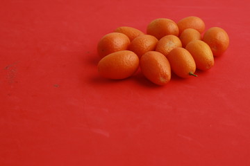 small and delicious orange fruits kumquat