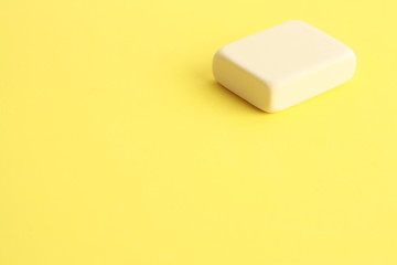 white eraser on color background