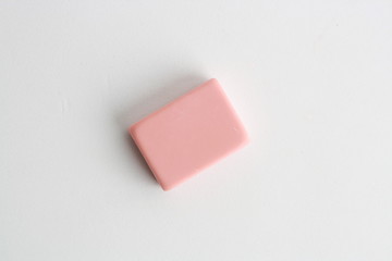 pink eraser on colorful background
