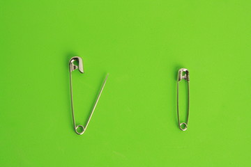sewing pin on colorful background