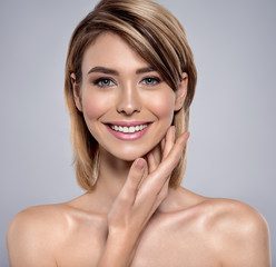 Front portrait of the woman with beauty face - isolated on white