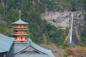 Scenic view of pagoda of Seiganto-ji Temple with Nachi no Taki waterfall in background at Nachi Katsuura, Wakayama, Japan