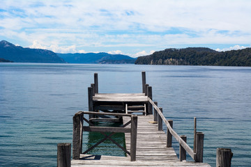 Wooden pier on lake.