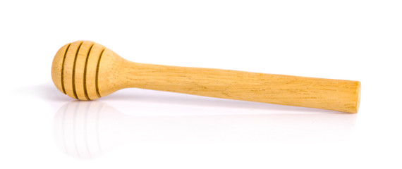 Honey dipper or spoon made from wooden isolated on white background