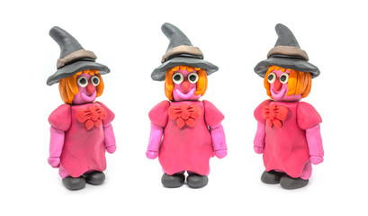 Play dough Witch on white background. Handmade clay plasticine