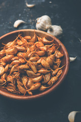 Garlic Fry or Tala Hua Lahsun in hindi, is a popular side dish or snacks from maharashtra, India