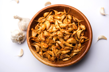Garlic Fry or Tala Hua Lahsun in hindi, is a popular side dish or snacks from maharashtra, India