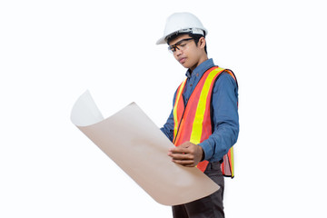 Handsome young engineer wearing a safety helmet holding blueprint white construction projects. White background.