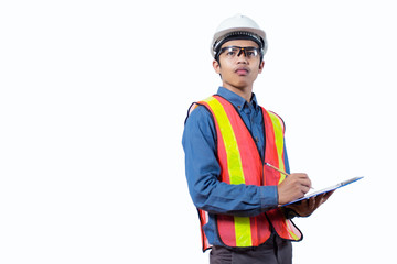 Handsome young engineer wearing a safety helmet holding blueprint white construction projects. White background.